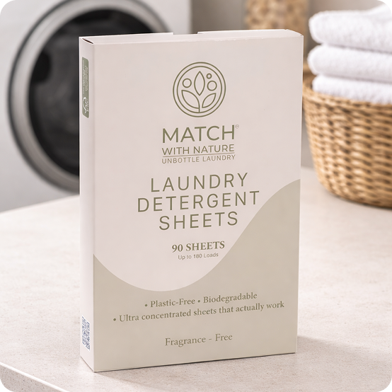 Box of Match with Nature laundry detergent sheets with a washing machine.