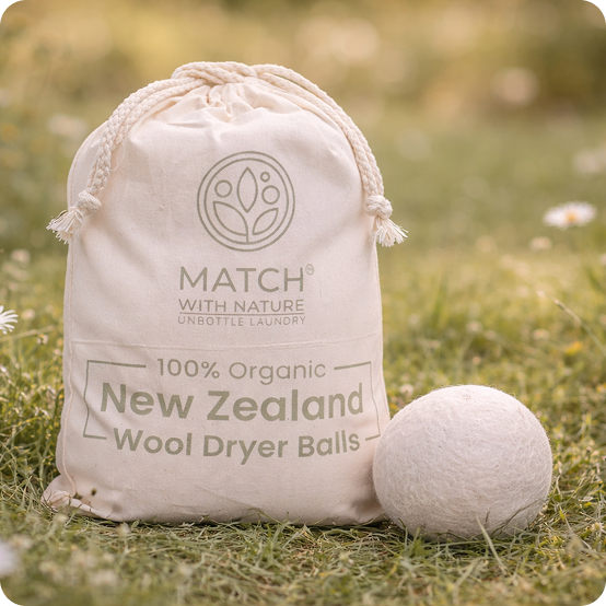 Bag of Match with Nature organic New Zealand wool dryer balls on grass