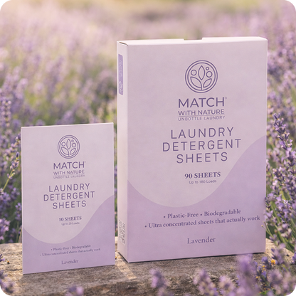 Two boxes of Match with Nature laundry detergent sheets in a lavender field